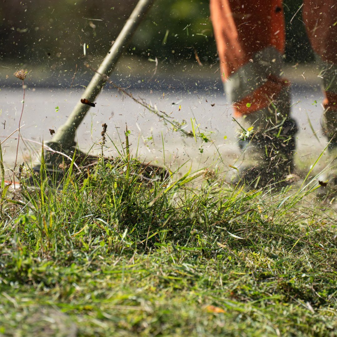 Grounds maintenance and trimming on a Summit Group job