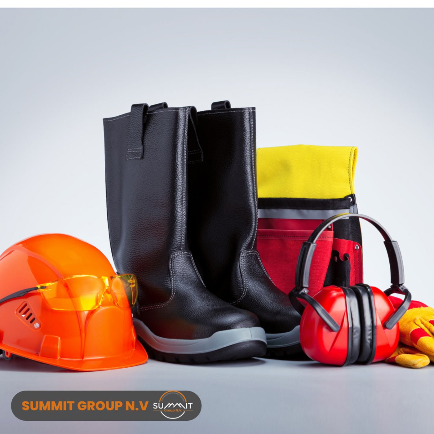 Standard site kit used by Summit Group crews: hard hat, boots, ear protection, and gloves